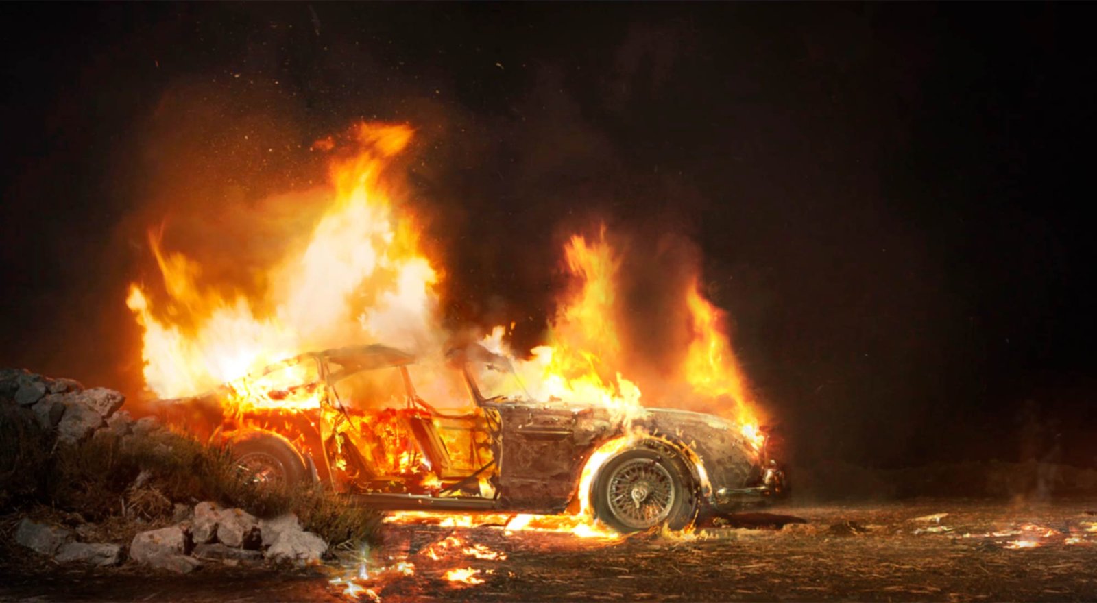 1 third scale model of the DB5 on fire